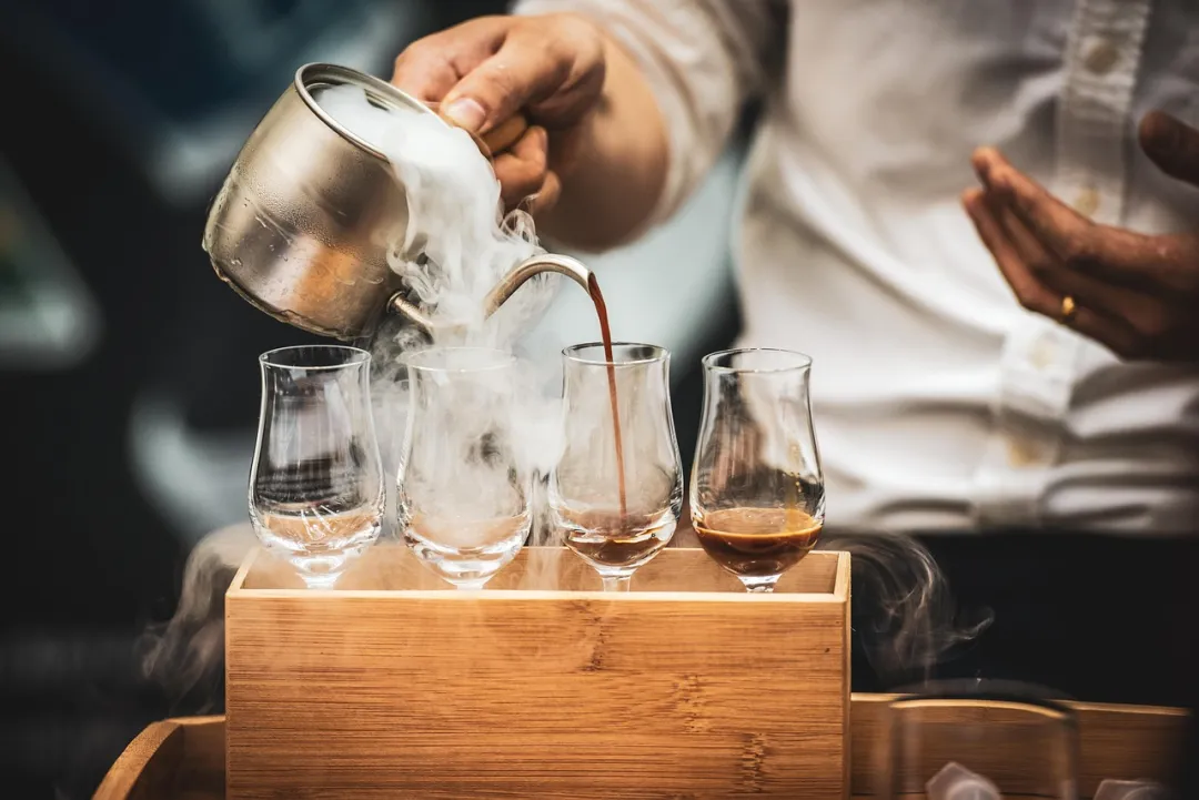 A bartender working inside a restaurant