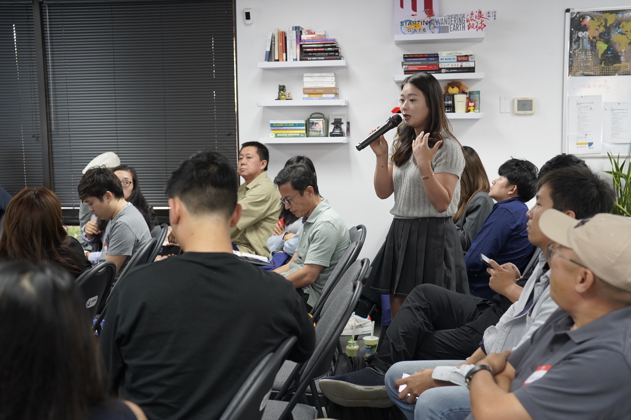 A participant sharing an idea at a Restaurateur Club gathering in Silicon Valley